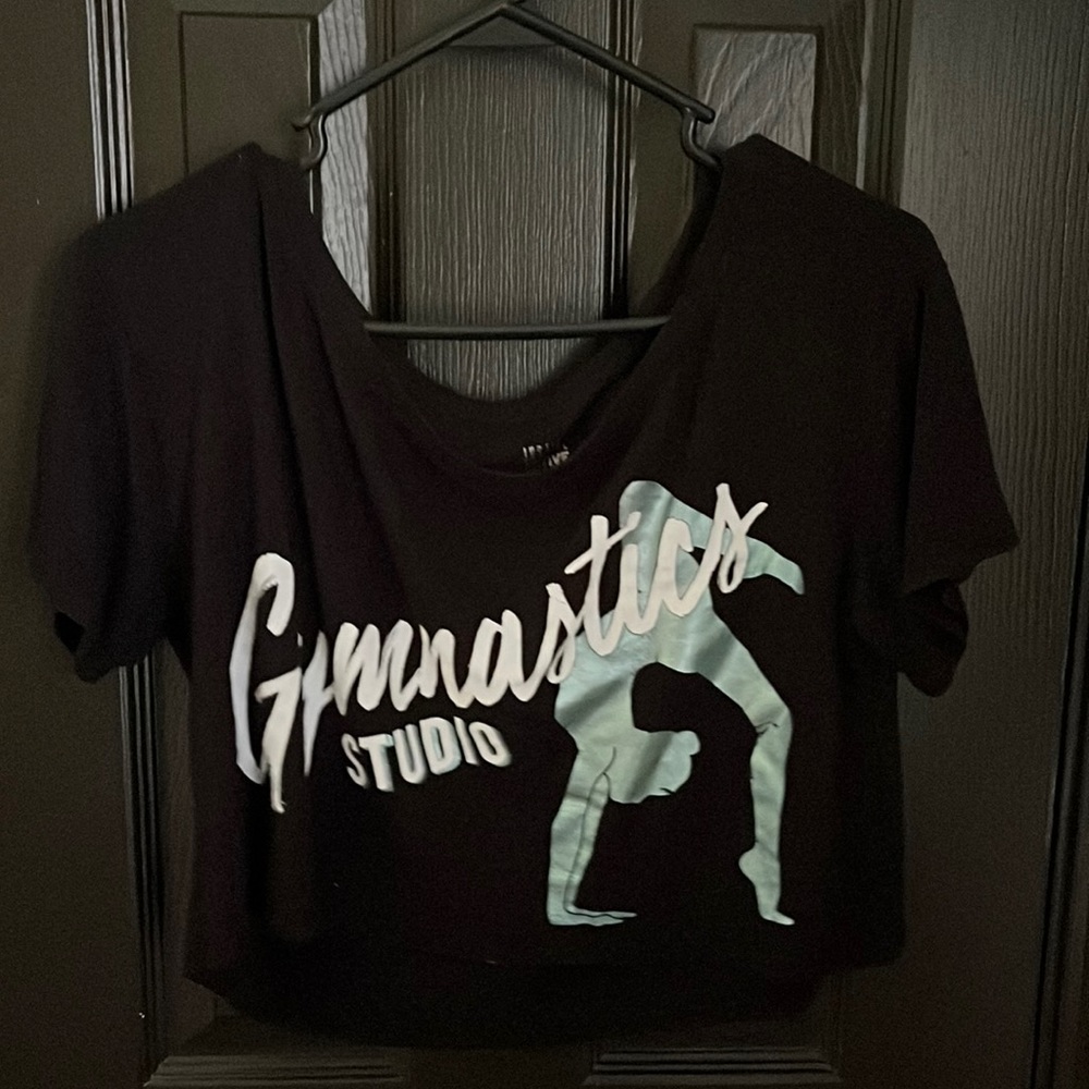 Black gymnast kids shirt size 14/16 (used)